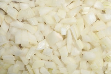 Fresh cut onion as background, closeup view