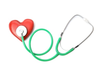 Photo of Red heart and stethoscope on white background, top view. Cardiology concept