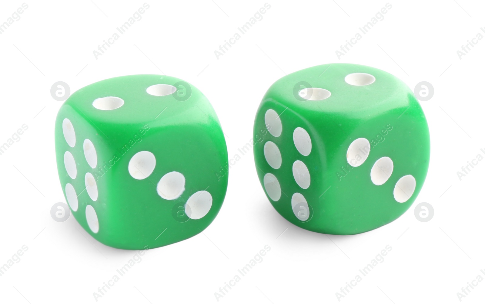 Photo of Two green game dices isolated on white