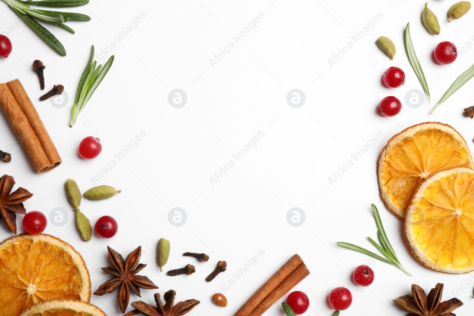 Photo of Different mulled wine ingredients on white background, flat lay. Space for text