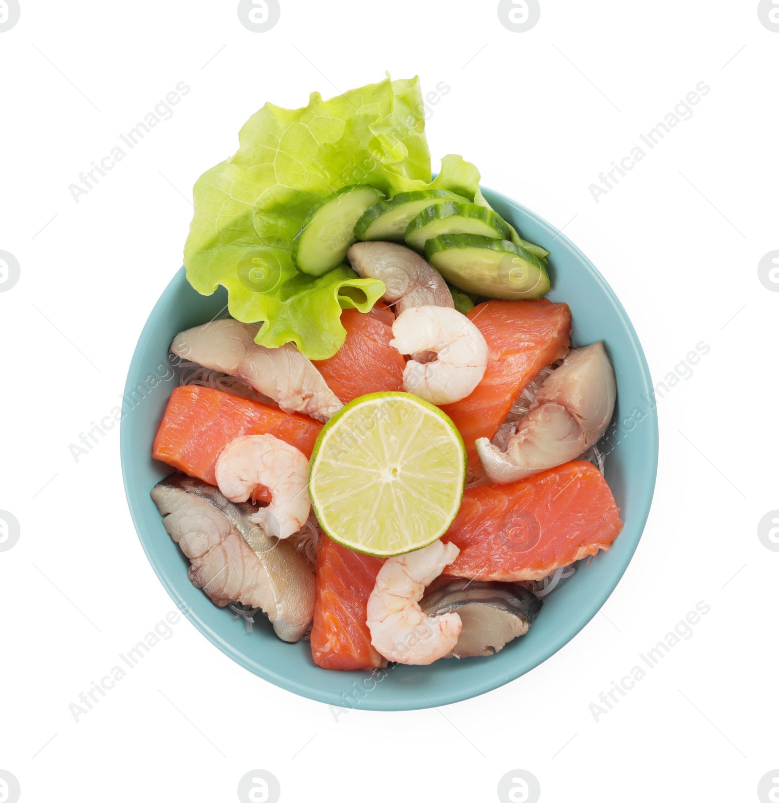 Photo of Delicious mackerel, tuna and shrimps served with cucumbers, lettuce and lime isolated on white, top view. Tasty sashimi dish