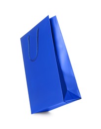 Photo of One blue shopping bag isolated on white