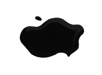 Photo of Blots of black liquid on white background, top view