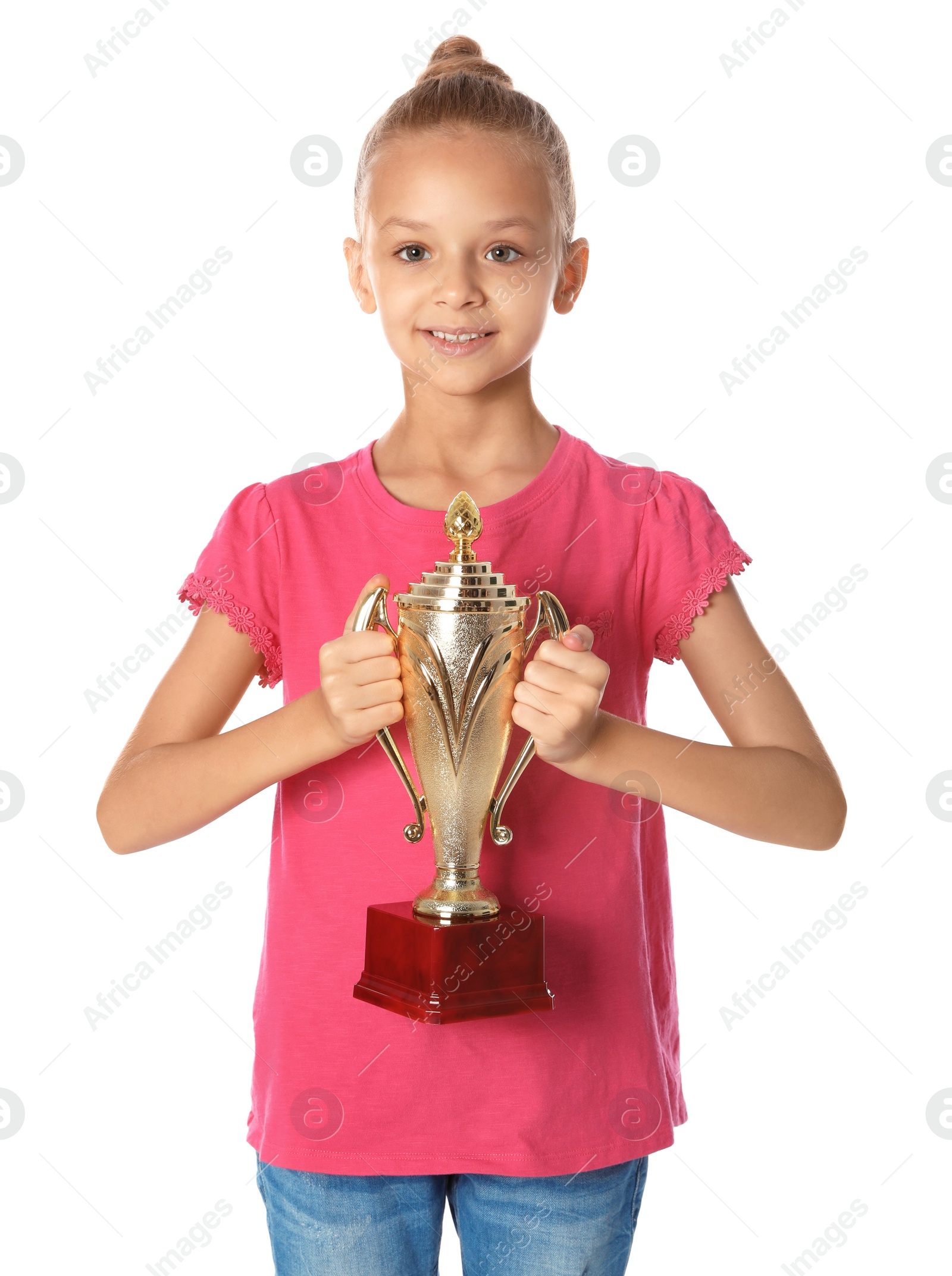 Photo of Happy girl with golden winning cup on white background