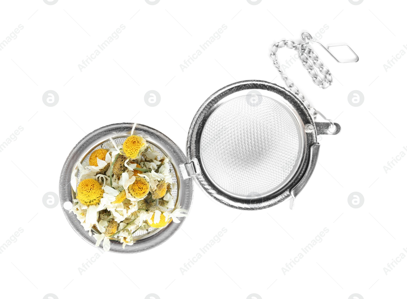 Photo of Dry chamomile flowers in infuser isolated on white, top view