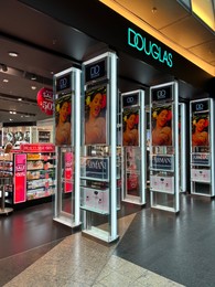 Photo of WARSAW, POLAND - JULY 17, 2022: Douglas cosmetics store in shopping mall