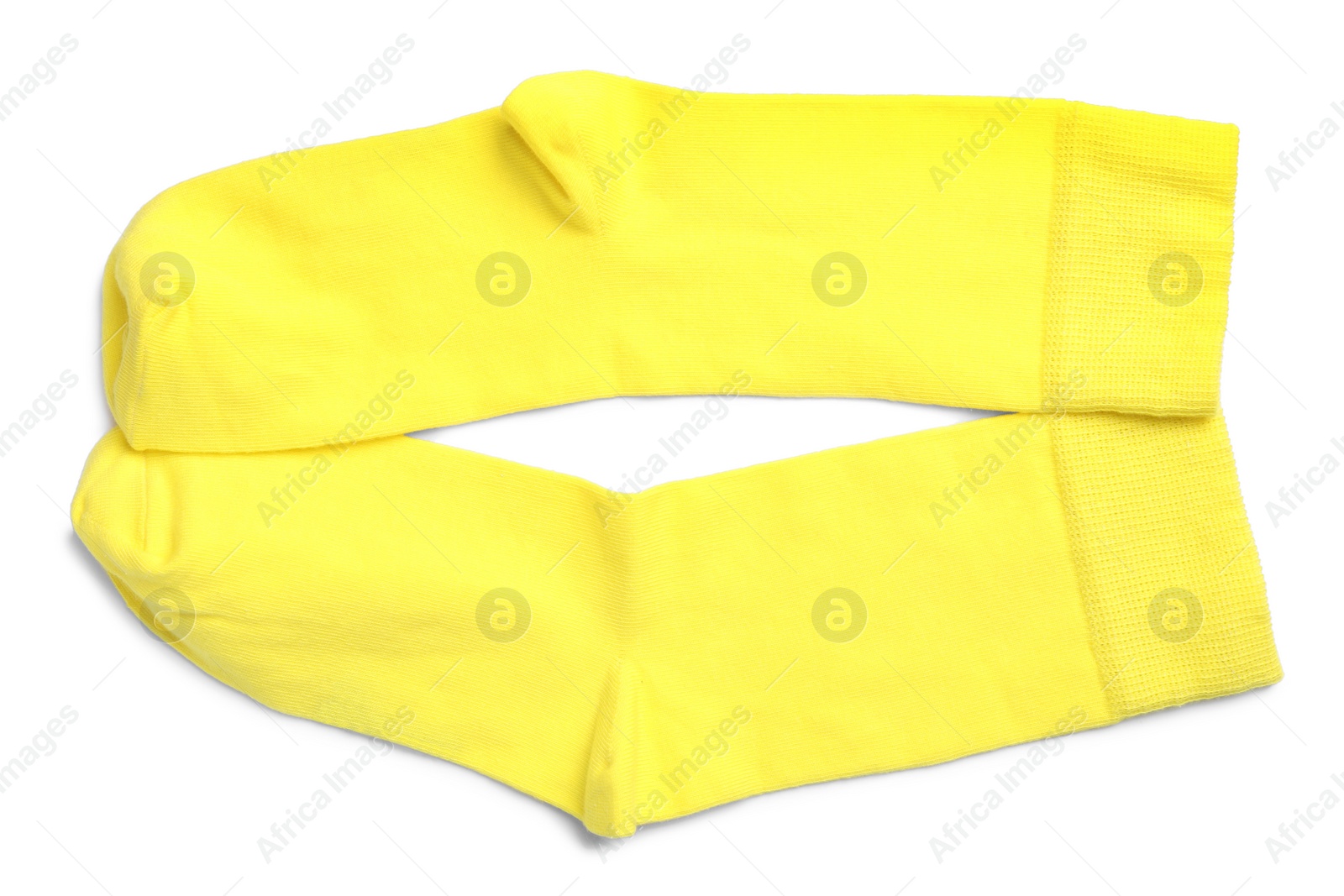 Photo of Pair of yellow socks on white background, top view