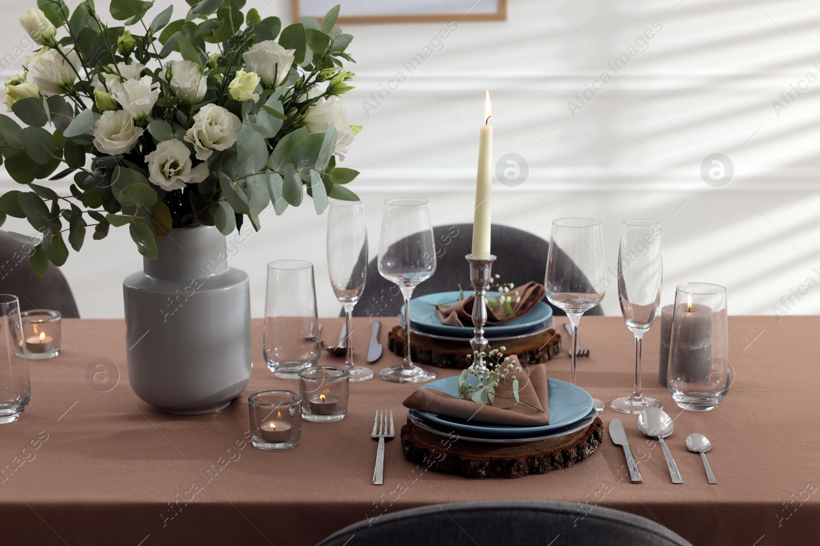 Photo of Festive table setting with beautiful tableware and decor indoors