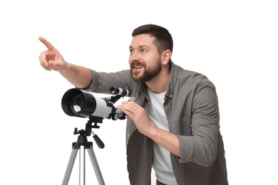 Photo of Happy astronomer with telescope pointing at something on white background