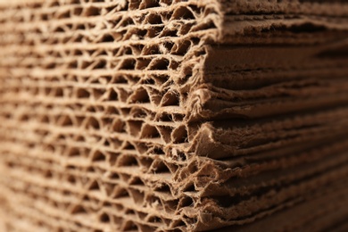Photo of Closeup view of corrugated cardboard sheets. Recyclable packaging material