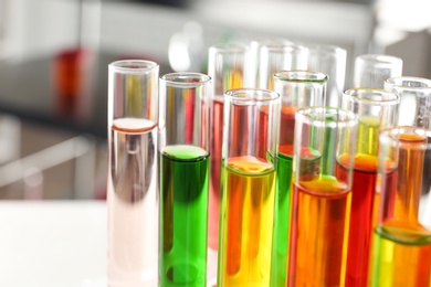 Photo of Test tubes with samples in chemistry laboratory, closeup