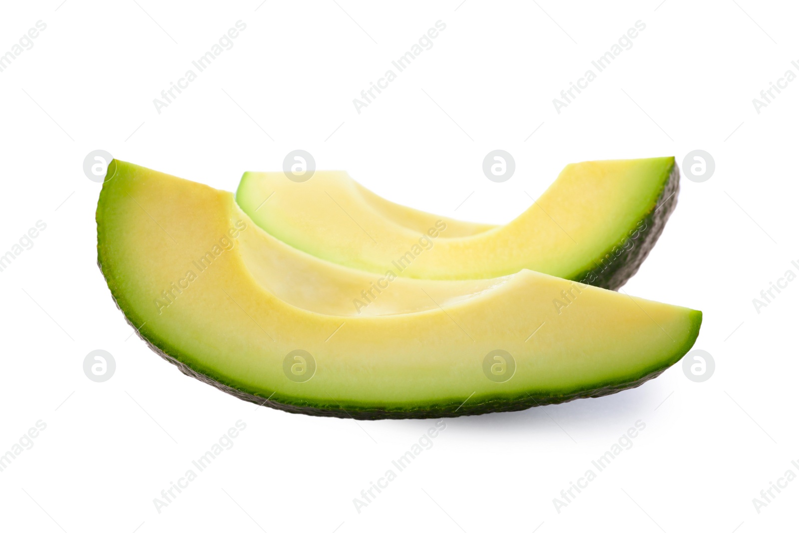 Photo of Slices of ripe avocado isolated on white