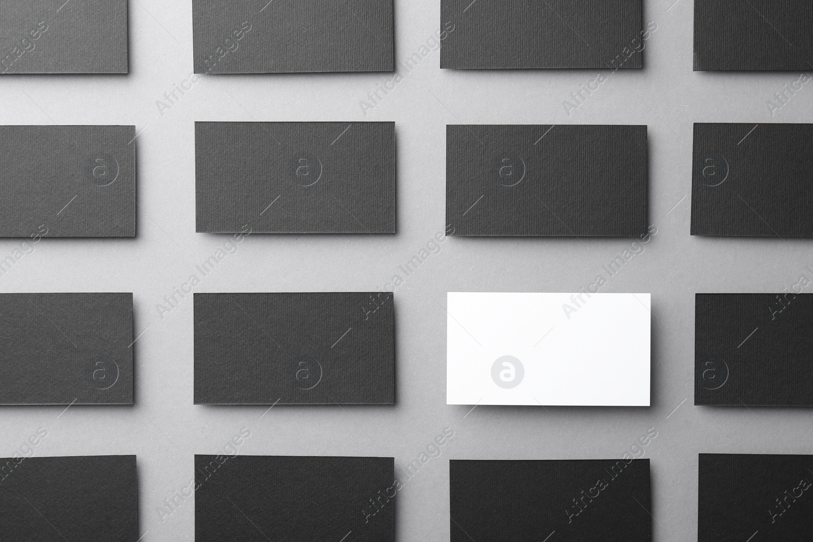 Photo of Blank business cards on light grey background, flat lay. Mockup for design