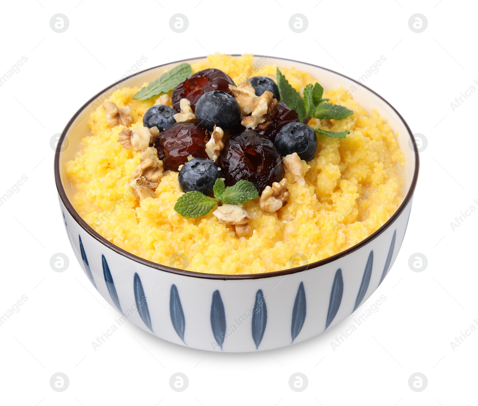 Photo of Tasty cornmeal with blueberries, dates, walnuts and mint in bowl isolated on white