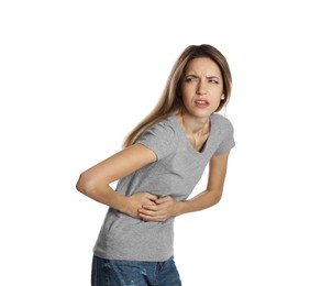 Photo of Young woman suffering from liver pain on white background