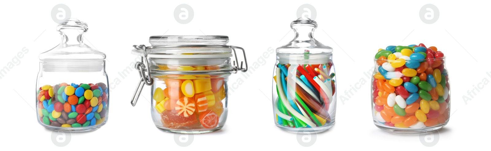 Image of Set of different sweet candies in glass jars isolated on white