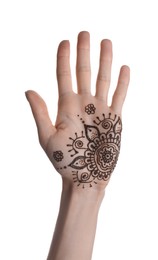 Photo of Woman with henna tattoo on palm against white background, closeup. Traditional mehndi ornament