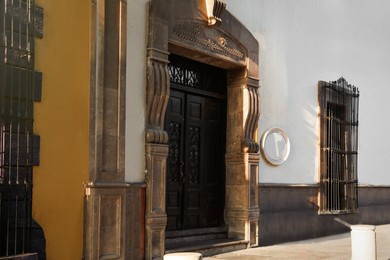 Photo of Entrances of building with beautiful vintage doors