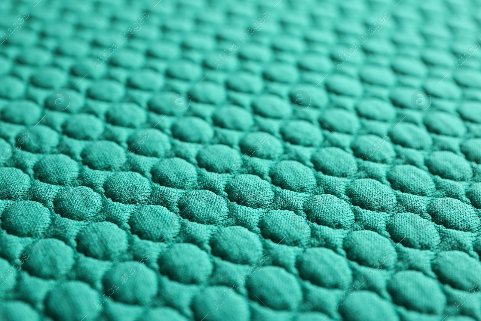 Photo of Textured turquoise fabric as background, closeup view