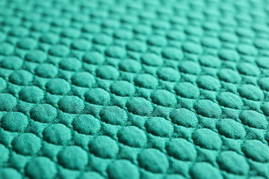 Photo of Textured turquoise fabric as background, closeup view