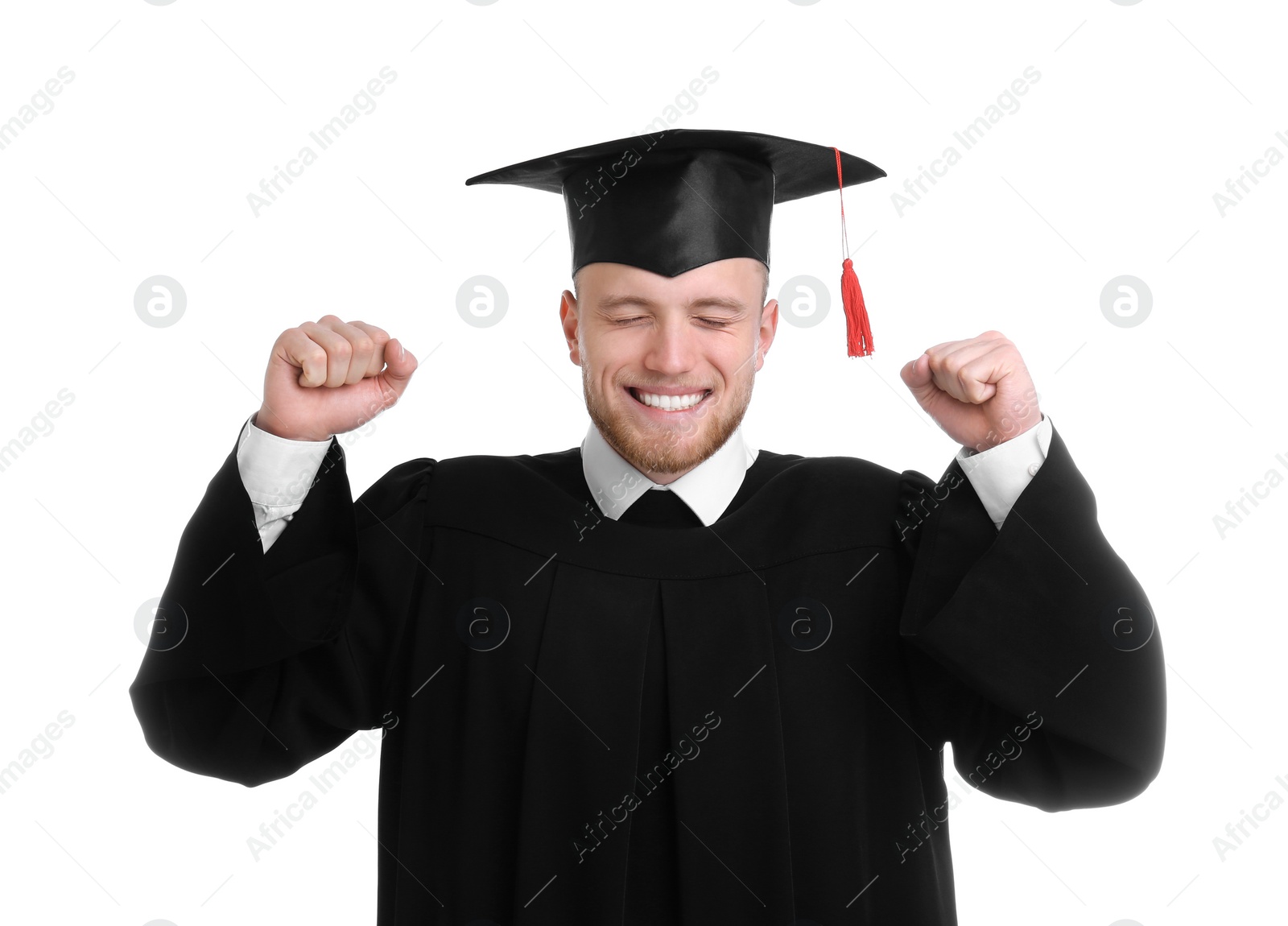 Photo of Happy student wearing graduation hat on white background