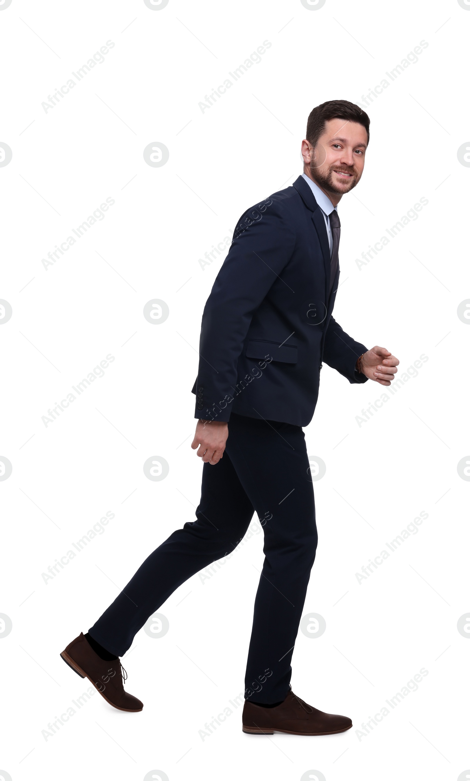 Photo of Handsome bearded businessman in suit on white background