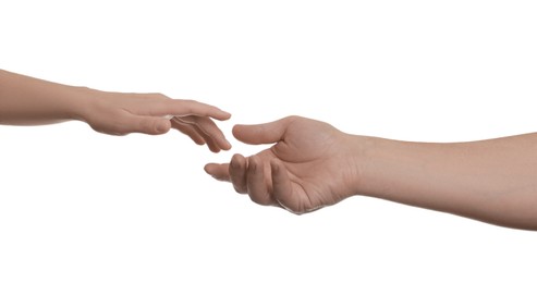 Photo of Man and woman reaching to each other on white background, closeup of hands