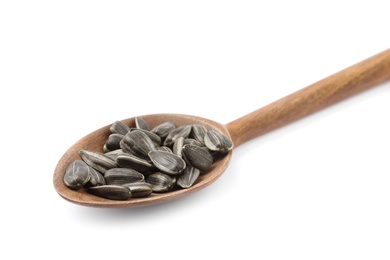 Raw organic sunflower seeds in wooden spoon isolated on white