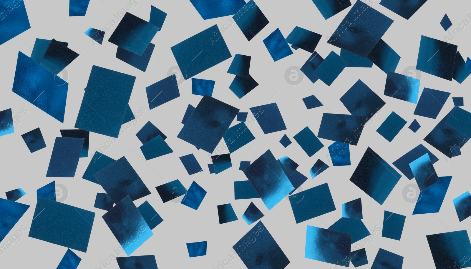 Image of Shiny blue confetti falling on grey background. Banner design