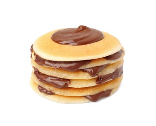 Photo of Stack of tasty pancakes with chocolate spread isolated on white