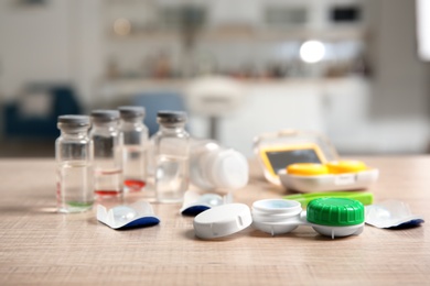 Photo of Contact lens case and accessories on table