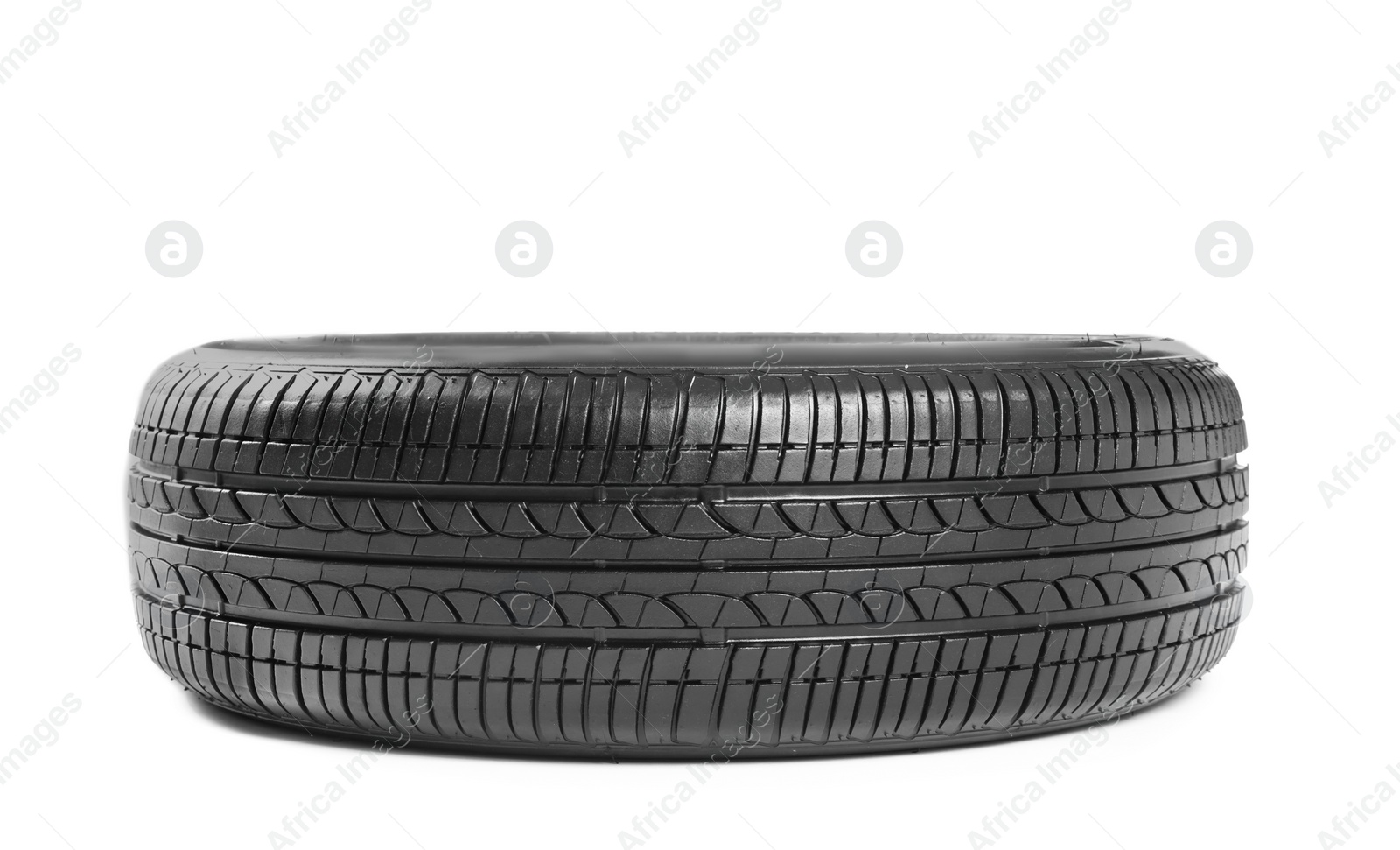 Photo of Car tire on white background