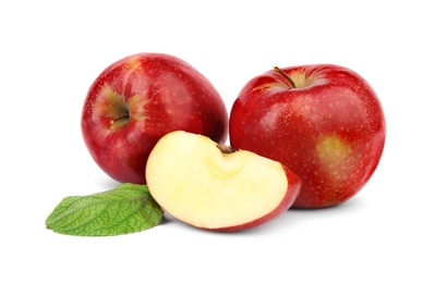 Ripe juicy red apples with leaf on white background