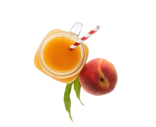 Freshly made tasty peach juice on white background, top view