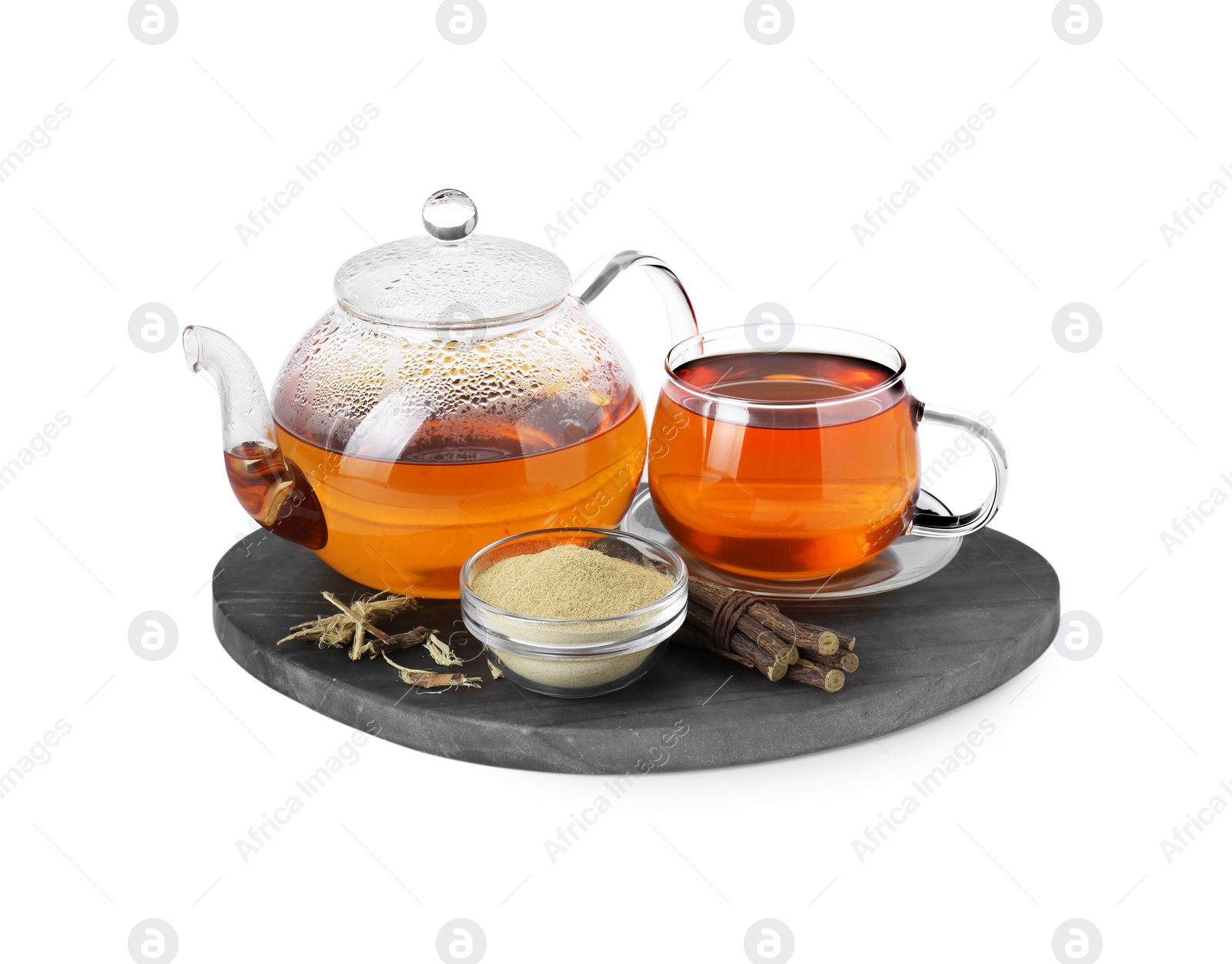 Photo of Aromatic licorice tea, dried sticks of licorice root and powder on white background