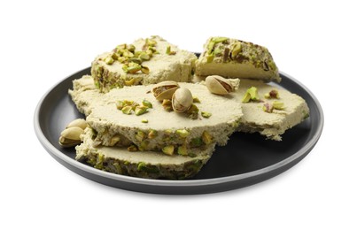 Photo of Pieces of tasty halva with pistachios on white background