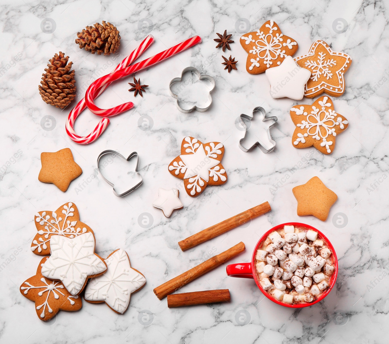 Photo of Flat lay composition with decorated Christmas cookies on white marble table