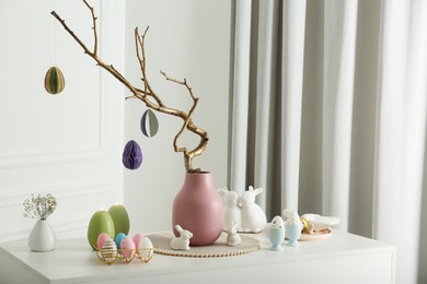 Photo of Beautiful festive composition with Easter decor on white table indoors