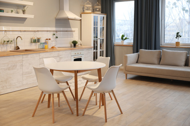 Photo of Modern kitchen interior with new stylish furniture