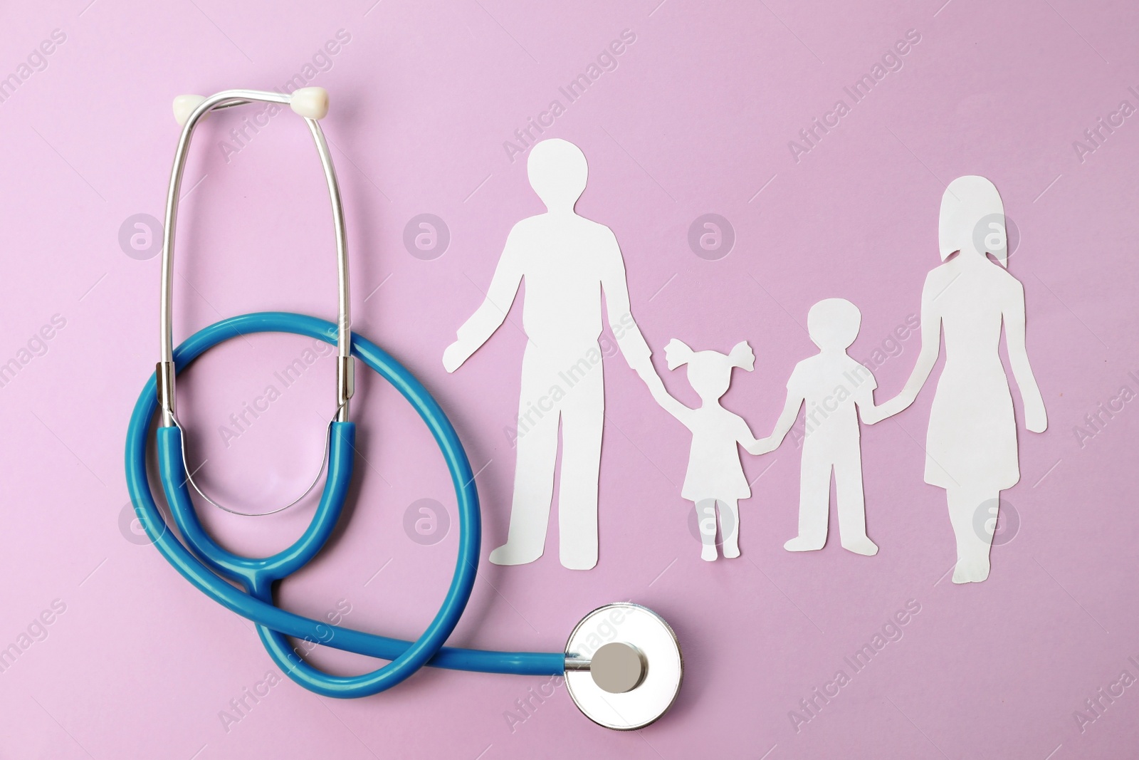 Photo of Stethoscope and paper cutout of family on color background, top view