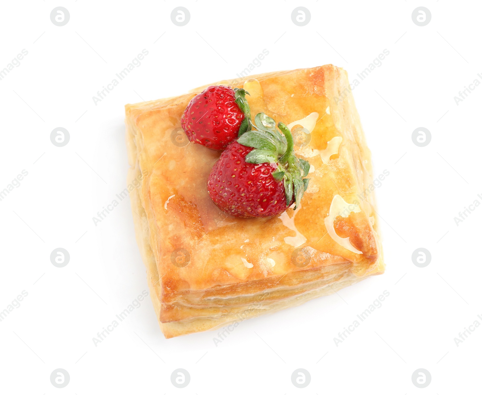 Photo of Fresh delicious puff pastry with sweet strawberries on white background, above view