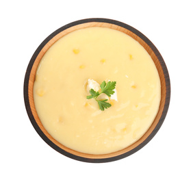 Photo of Delicious corn cream soup isolated on white, top view