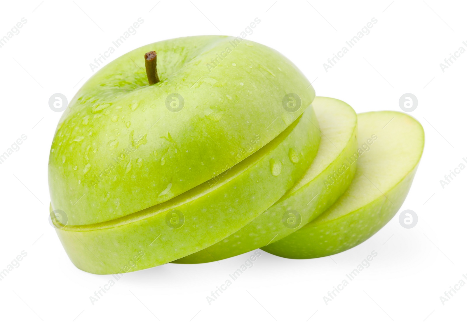 Sliced ripe green apple isolated on white Photo of Sliced ripe green apple isolated on white