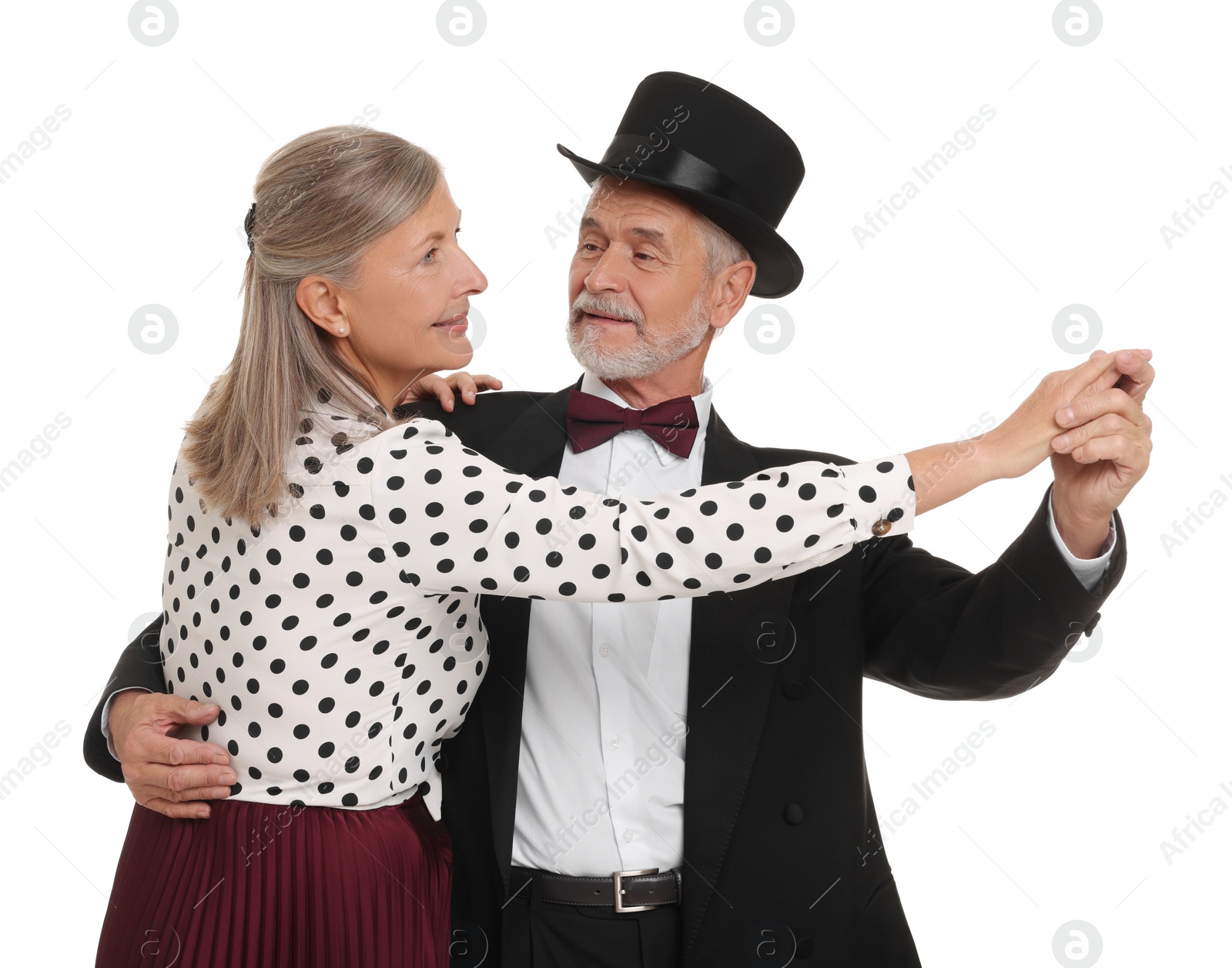 Photo of Senior couple dancing together on white background