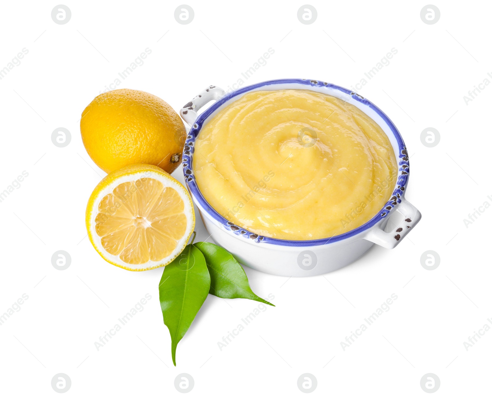 Photo of Delicious lemon curd in bowl, fresh citrus fruits and green leaves isolated on white