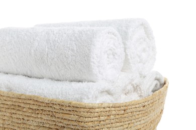 Photo of Wicker laundry basket with clean towels isolated on white