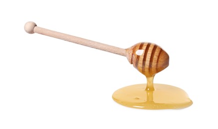 Natural honey dripping from dipper on white background