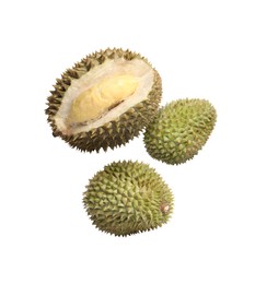 Image of Delicious ripe durian fruits falling on white background