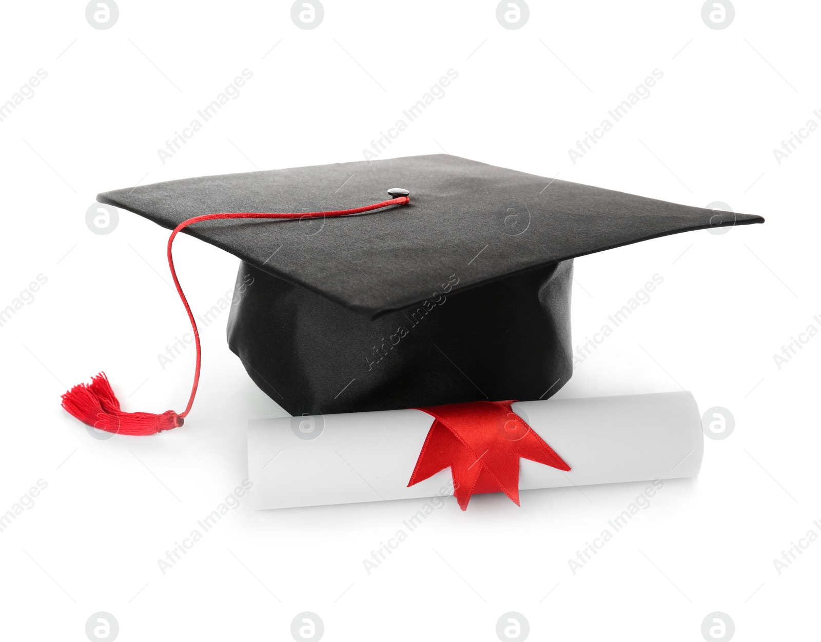 Photo of Graduation hat and diploma on white background