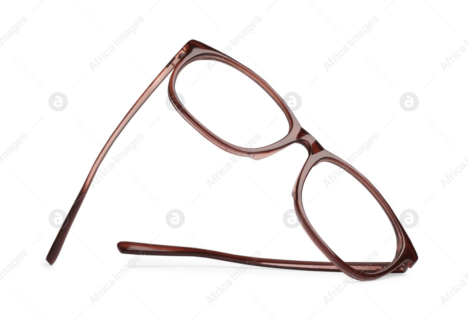 Photo of Stylish glasses with brown frame isolated on white